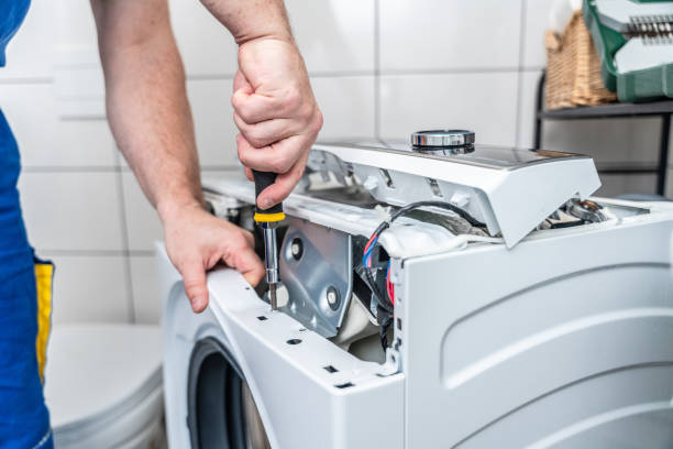 Experienced service team repairing appliances